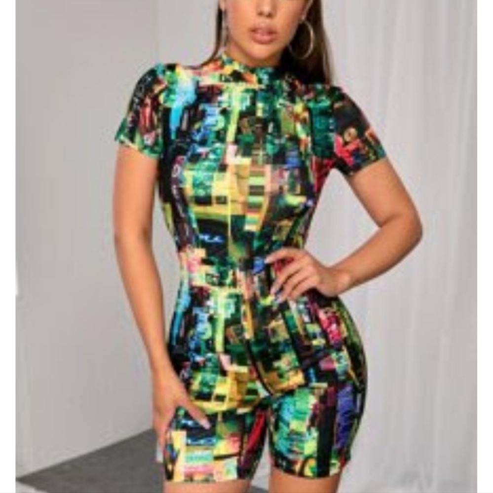 Futuristic romper never worn size med.